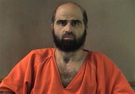 This undated file photo provided by the Bell County Sheriff's Department via The Temple Daily Telegram shows Nidal Hasan, the Army psychiatrist charged in the deadly 2009 Fort Hood shooting rampage. An Army appeals court will hear arguments Thursday, Oct. 11, 2012 about whether Hasan will be required to have his beard shaved before his court-martial, an issue that has indefinitely postponed his murder trial.
