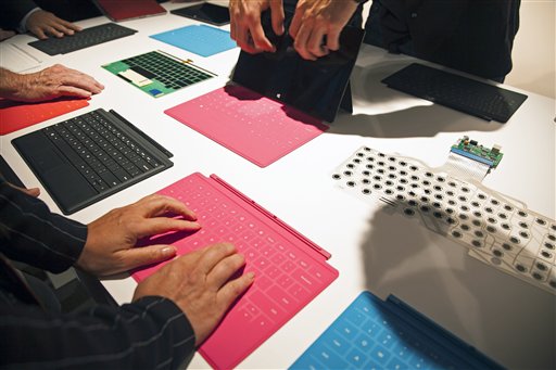 Microsoft's Surface tablet computers, aiming to compete with Apple's iPad, are displayed at Hollywood's Milk Studios in Los Angeles on Monday.