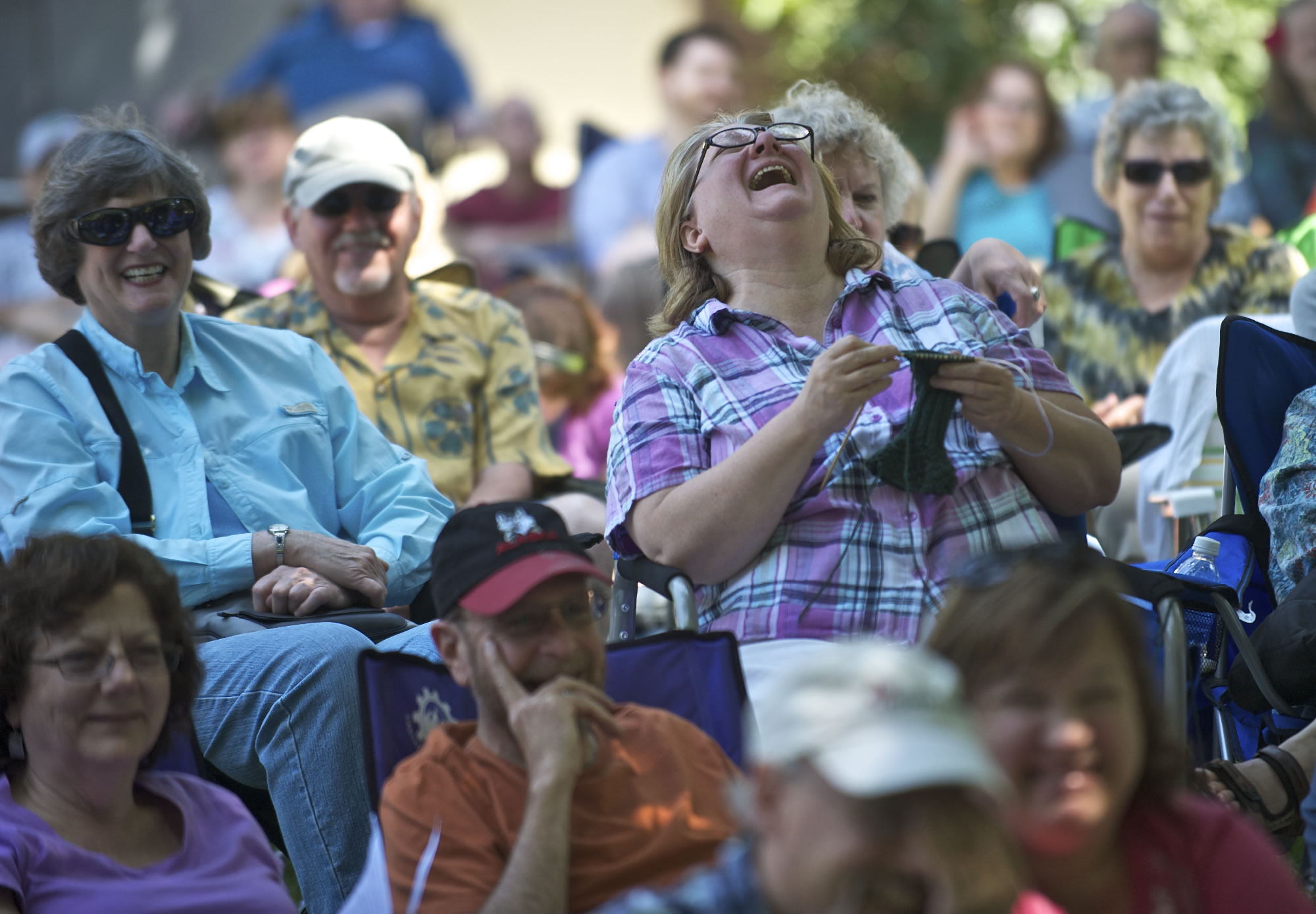 Audience members react as actors with the Original Practice Shakespeare Festival perform &quot;Comedie of Errors&quot; at Esther Short Park on Sunday. The actors use the same techniques as the actors during Shakespeare's time.