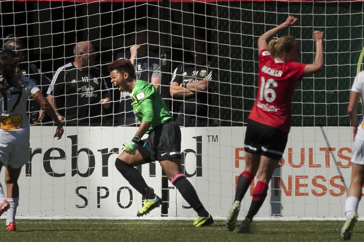 Goalkeeper Karina LeBlanc celebrates after saving penalty kick taken by Abby Wambach, during the second half of the Thorns FC game on Sunday.