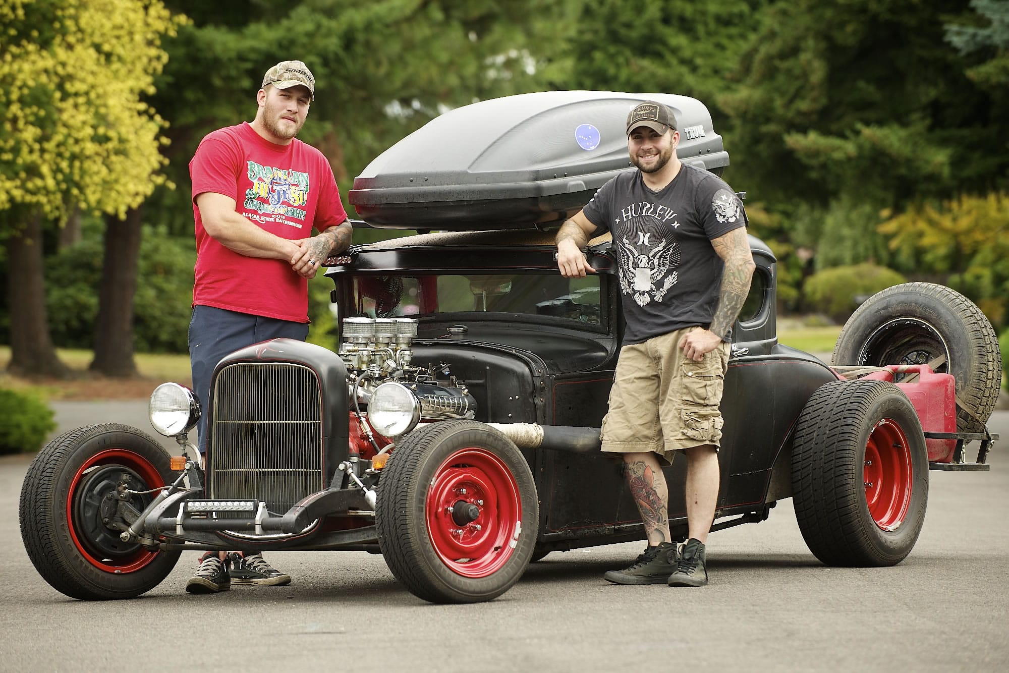 Aaron Showalter, left, and Lenny Cestaro stand next to a chopped 1935 Ford on Tuesday in Vancouver.