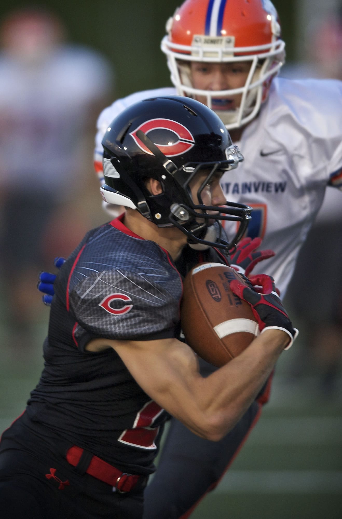 Camas High's Zach Eagle pulls down the first of his two interceptions against Auburn Mountainview on Friday.