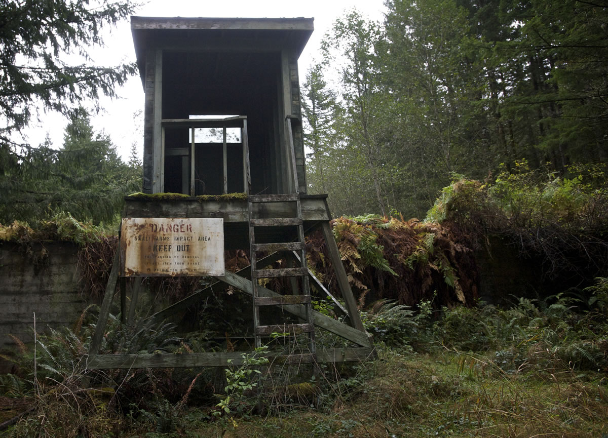 An abandoned observation tower for a grenade range stands near the south end of Camp Bonneville on Friday.