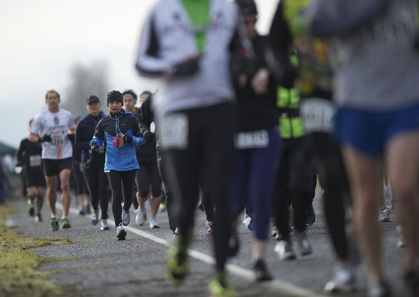 Runners compete in the annual Vancouver Lake Half Marathon at Vancouver Lake Park on Sunday.