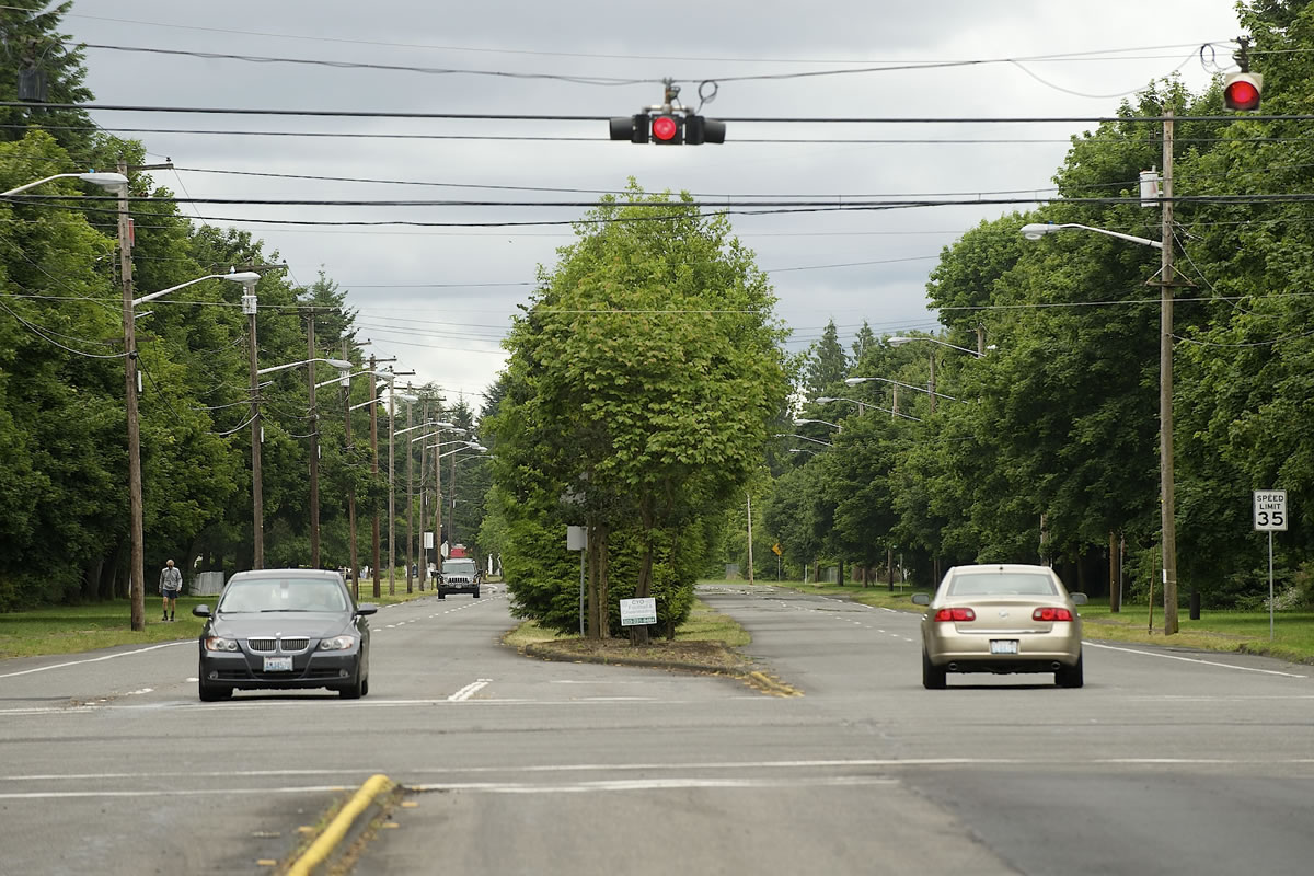 MacArthur Boulevard in the Vancouver Heights neighborhood, shown in this photograph looking east at the intersection with Andresen Road, will be resurfaced this summer as part of the city's pavement management program.
