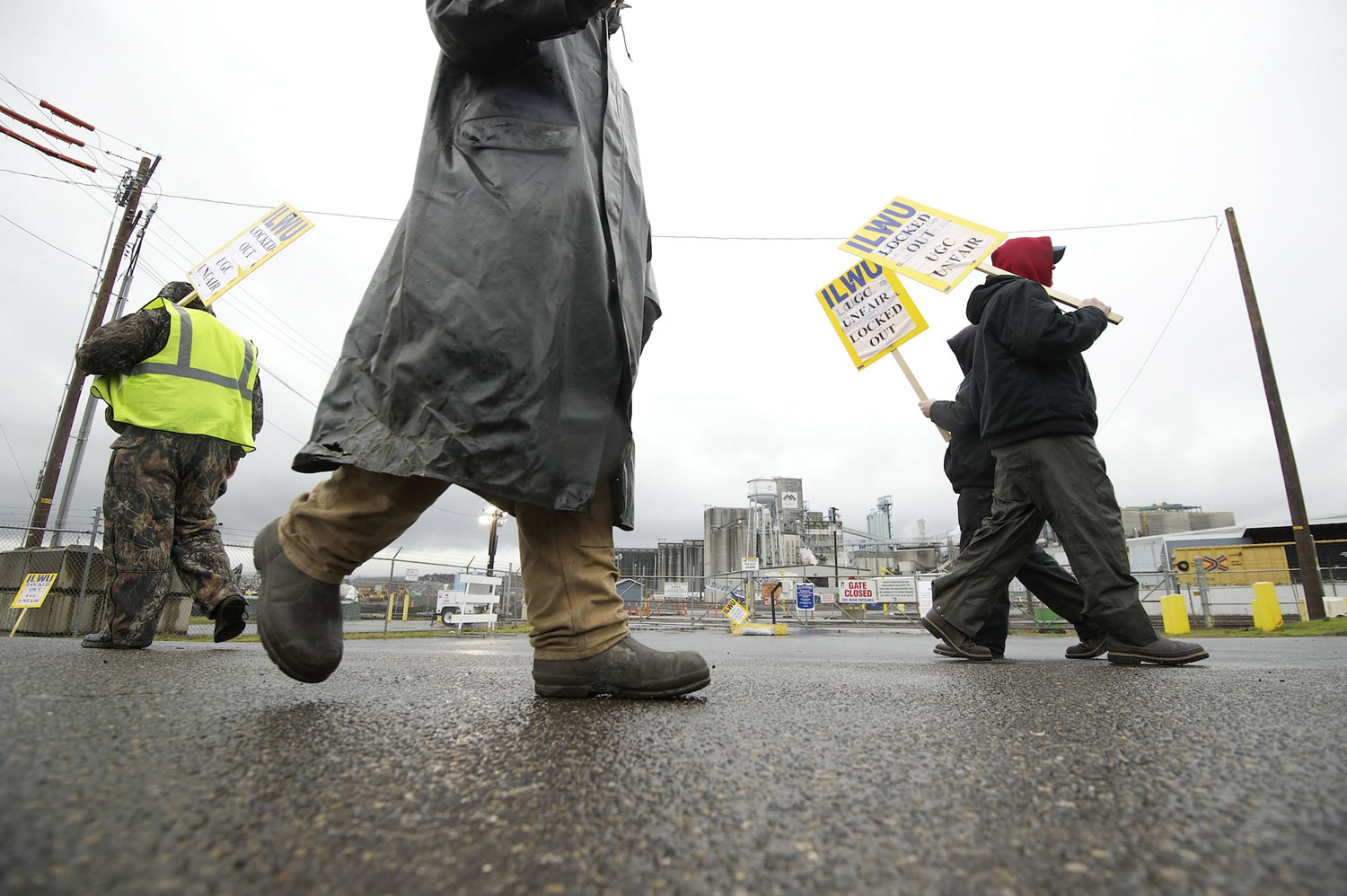 ILWU workers picket for a second day Thursday in front of the Port of Vancouver's Gate 2.