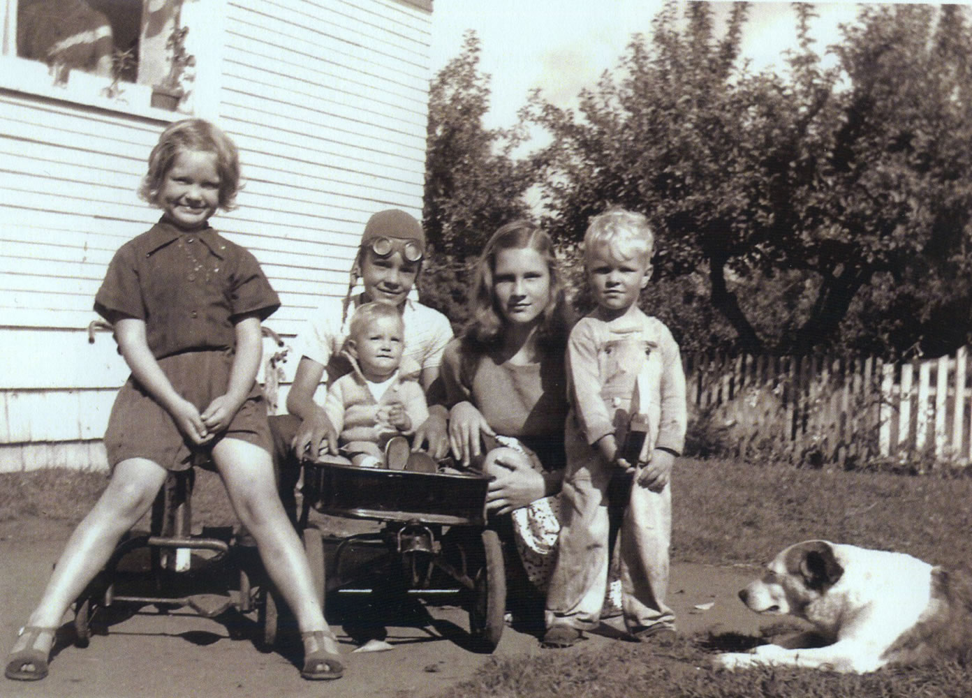 Gwen, from left, Harley (holding Linda), Kay and Dennis Hall, with Spot.