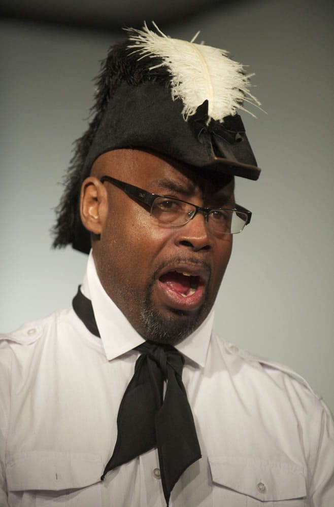 Serendipity Players cast member Calvin Kyles, portraying black nationalist Marcus Garvey, extols the virtues of returning to Africa.