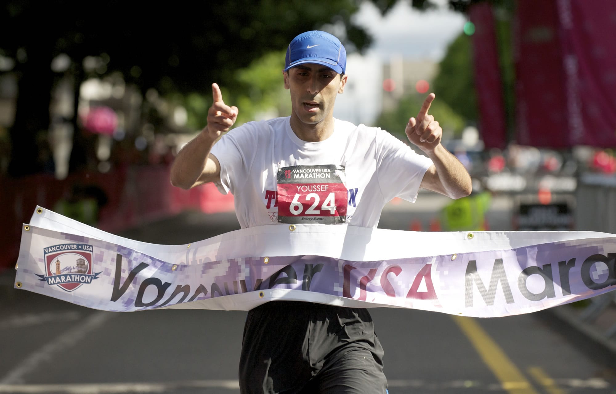 Vancouver resident Youssef Zirari runs away with the Vancouver USA Marathon title in 2 hours, 34 minutes, 25 seconds on Sunday.