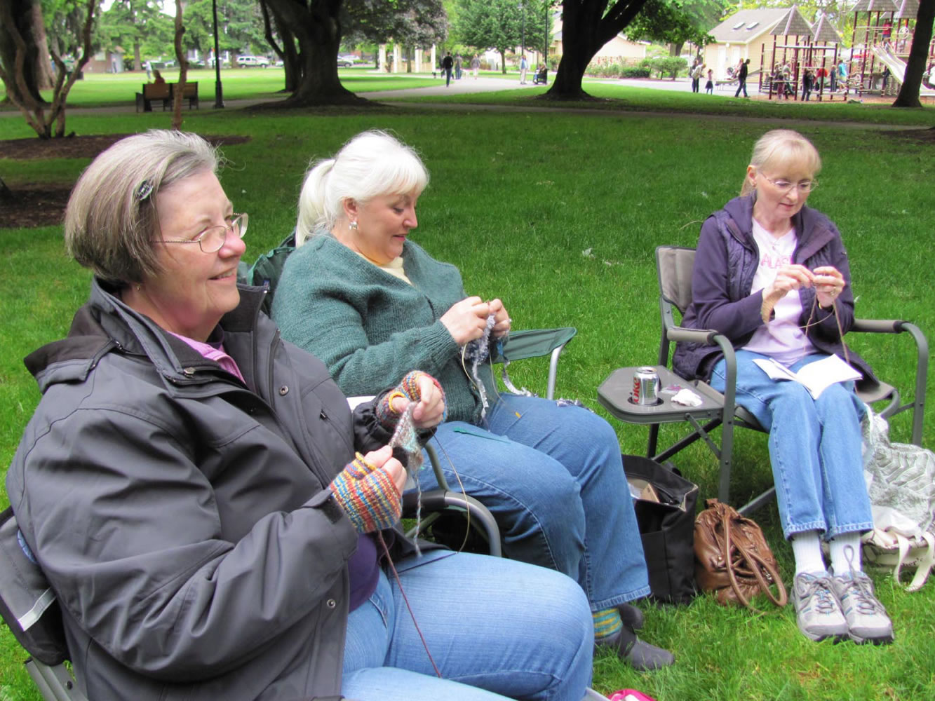 Esher Short Park: From left, Linda French Dawson, Fort Vancouver Knitters Guild president-elect Debra Cardiff and Sue Kuzma show off their knitting moves.