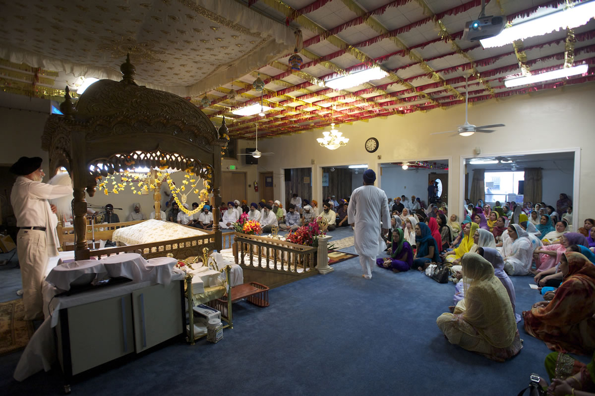 Before the candlelight vigil, a prayer service was held inside the Guru Ramdass Sikh temple.