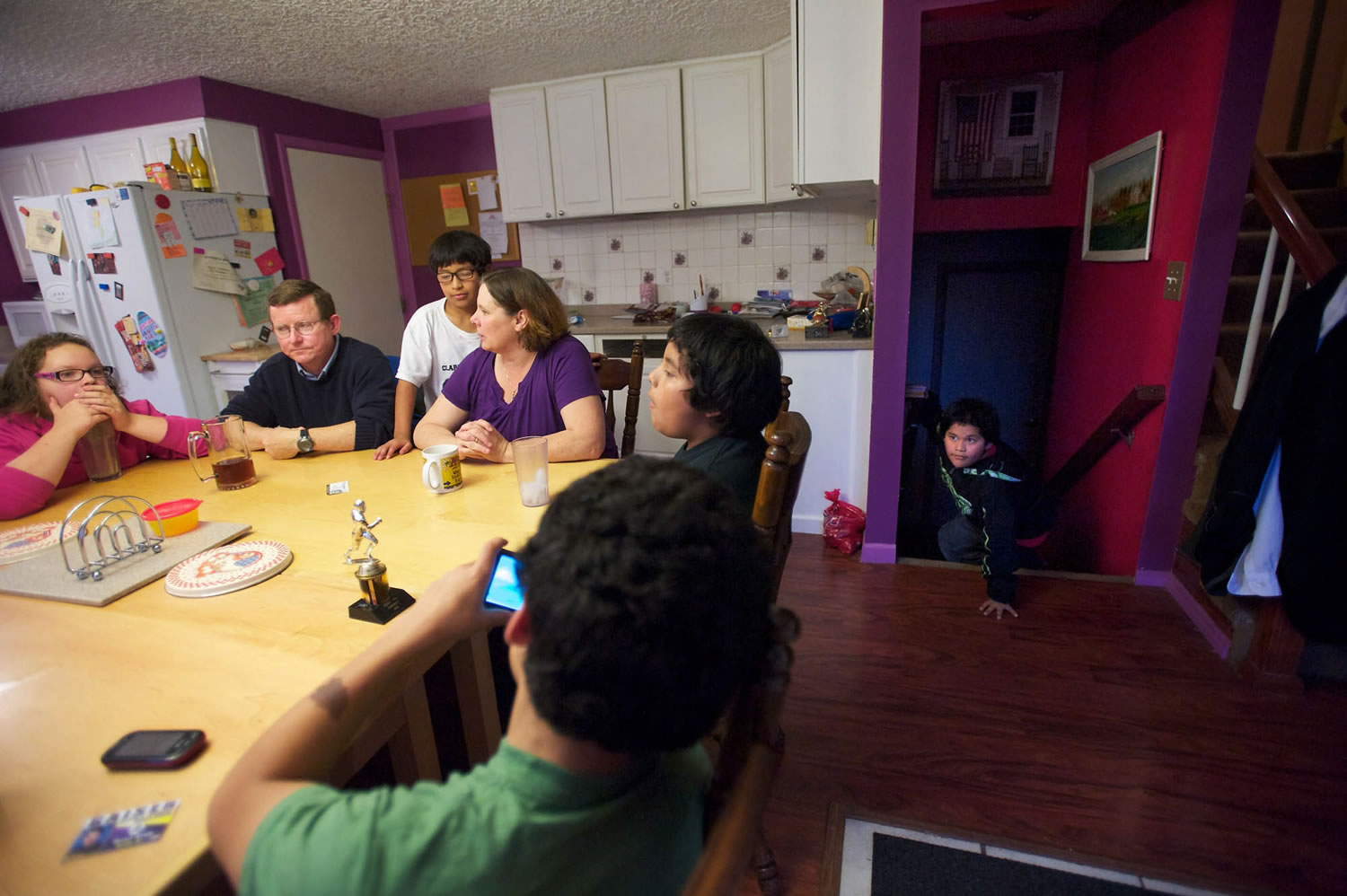 The Anders family (from left around the table): Shelby, 12; dad Forest; Uriel, 10; mom Trina; Rene, 12; Deven, 12.