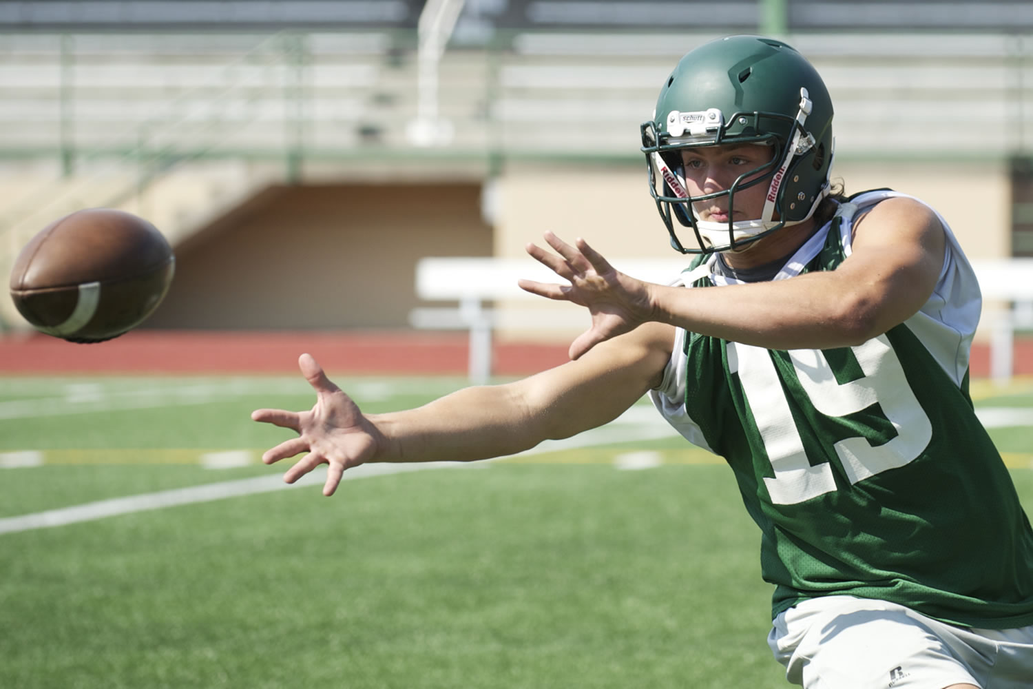 Evergreen High School linebacker Brody Bagnall participates in a drill at McKenzie Stadium, Wednesday.