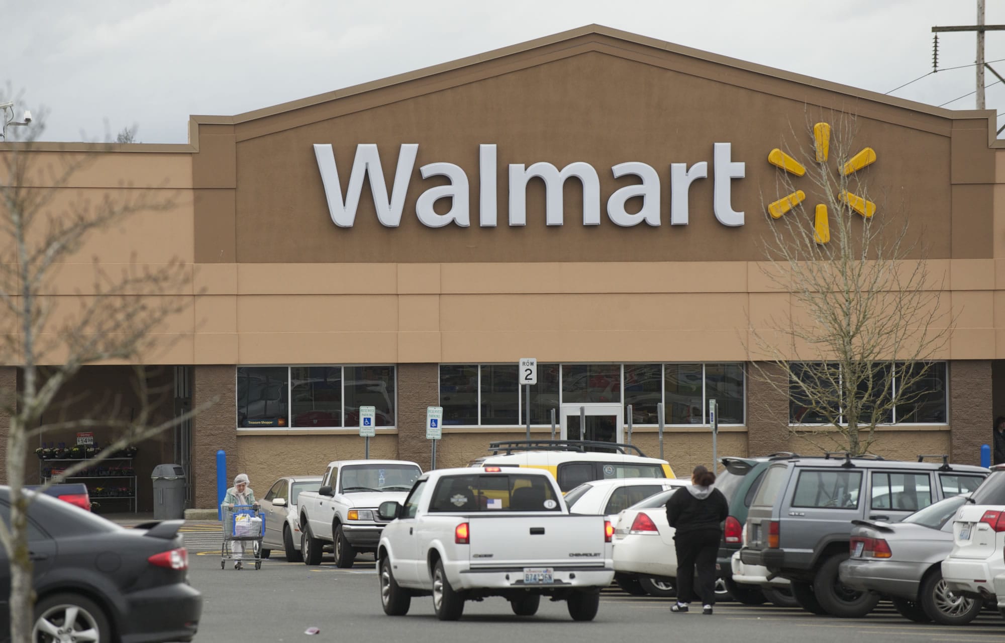 A Walmart development boom appears to be brewing throughout Clark County, where the company plans to build at least one new &quot;Neighborhood Market&quot; grocery store and three more Supercenters to join its two stores in Vancouver and this Hazel Dell store.