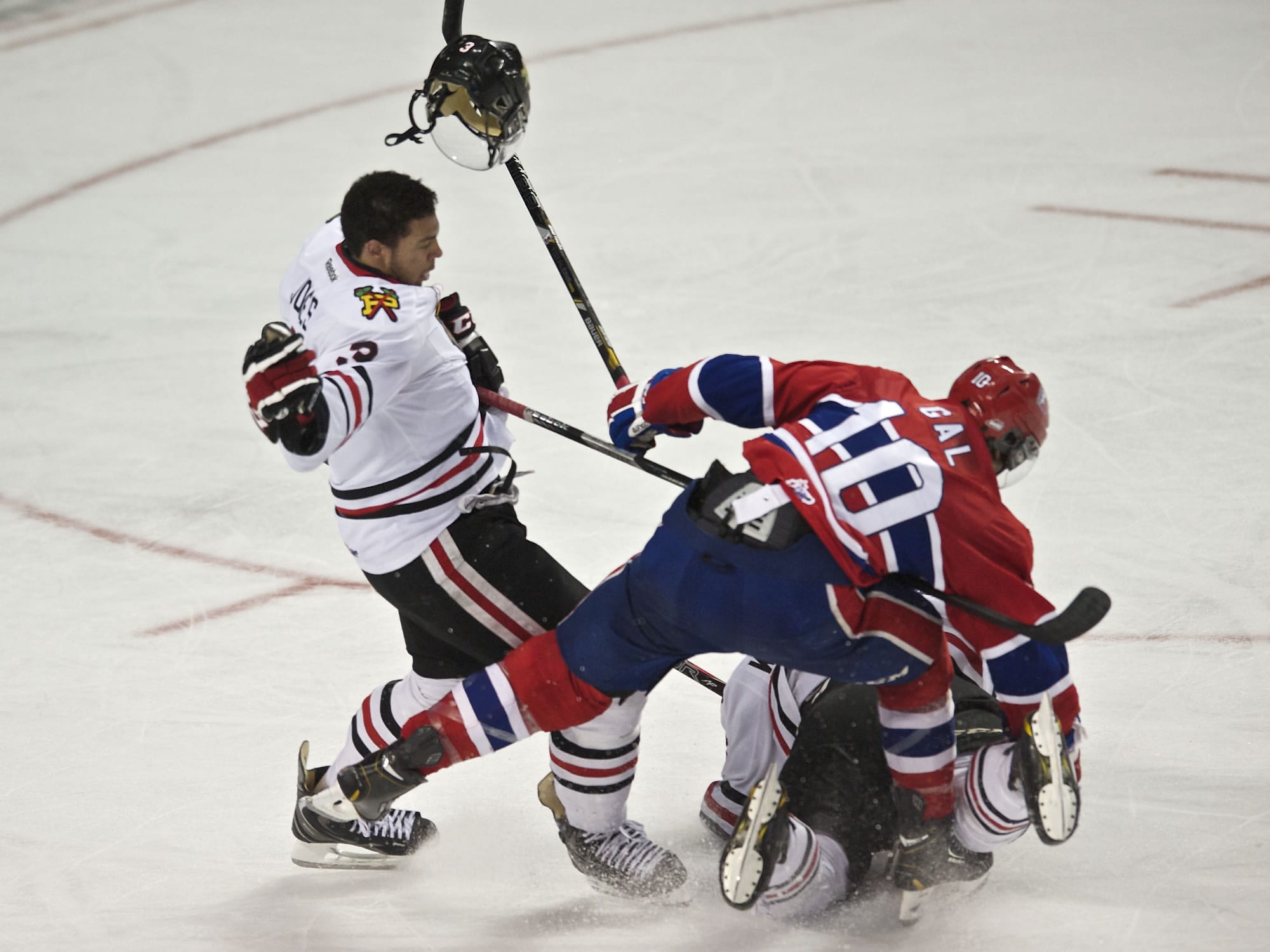 The Portland Winterhawks' Seth Jones has his helmet goes flying after colliding with the Spokane Chiefs' Blake Gal in the third period of game two of a second round playoff matchup on Saturday.