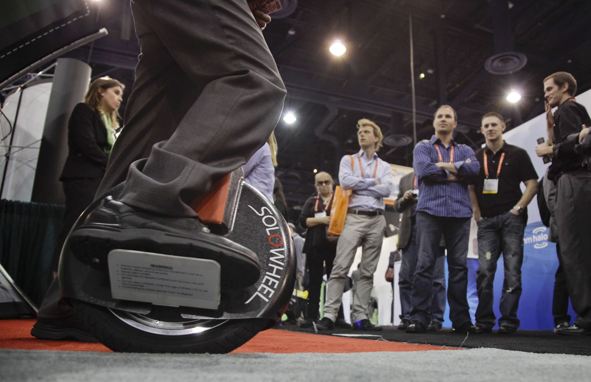 An exhibitor demonstrates a Solowheel at the 2012 International Consumer Electronics Show in Las Vegas.