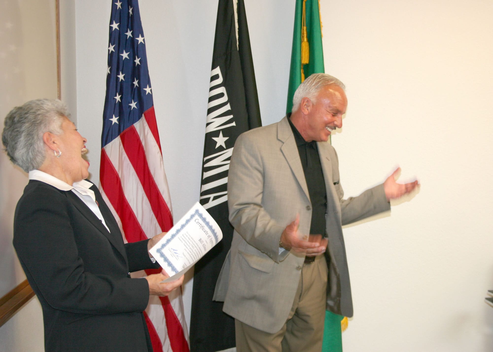 Salmon Creek: Bill Allman, a founding member of the Washington State Veterans Employee Resource Group, laughs it up while receiving a certificate of appreciation from Alfie Alvarado-Ramos, director of the Washington Department of Veterans Affairs.