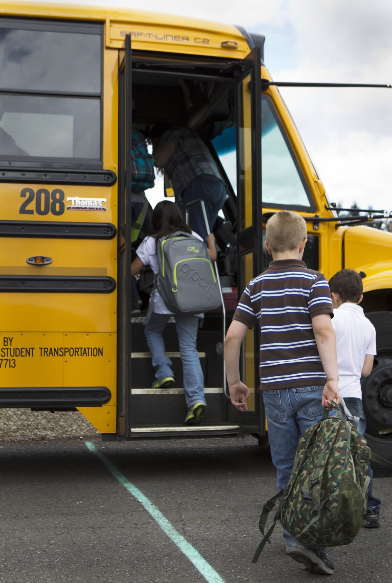 Students board a school bus at Hockinson Primary and Intermediate schools on Thursday.