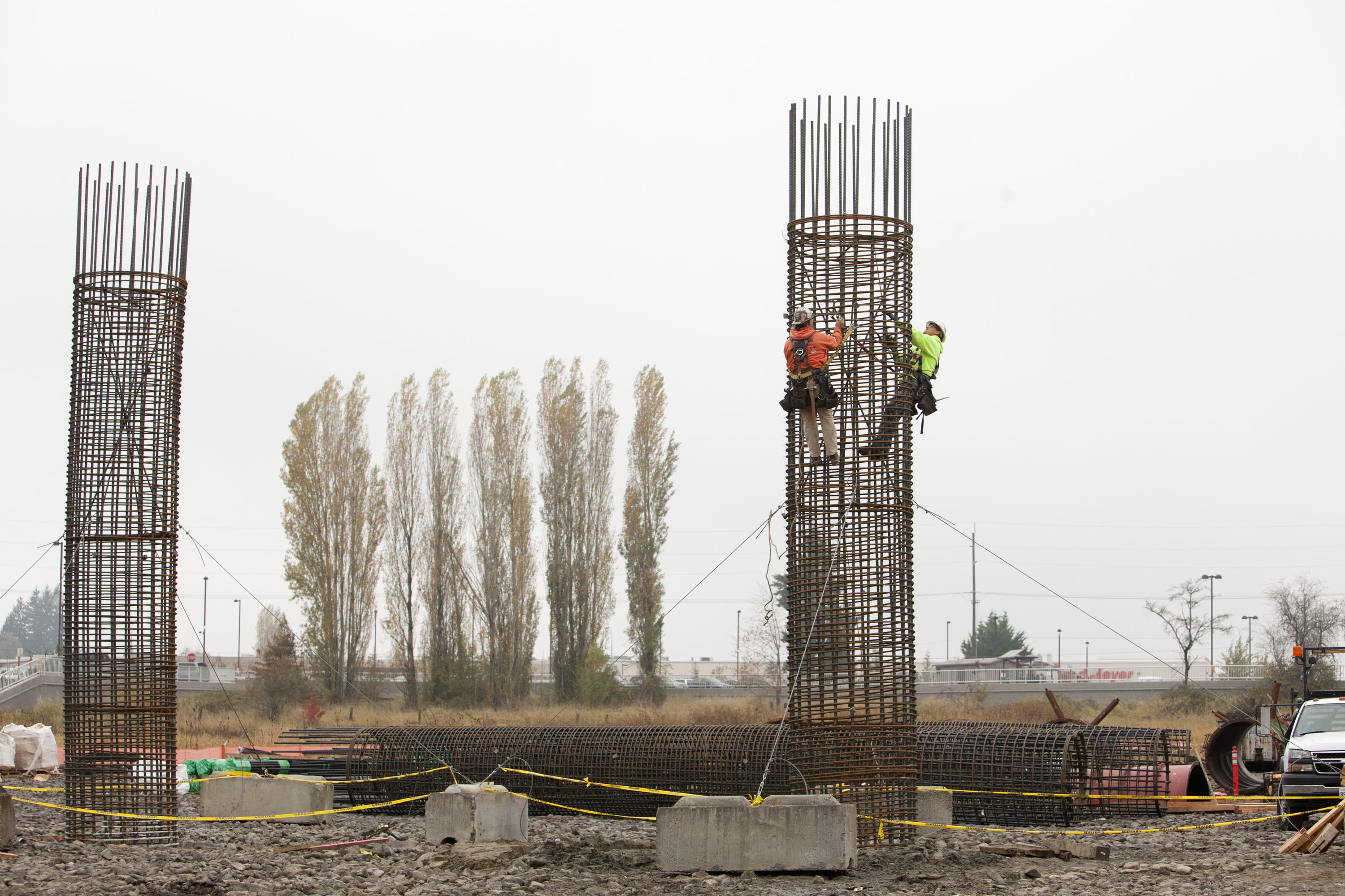 Construction crews work on rebar cages for bridge supports as part of the Salmon Creek Interchange Project.