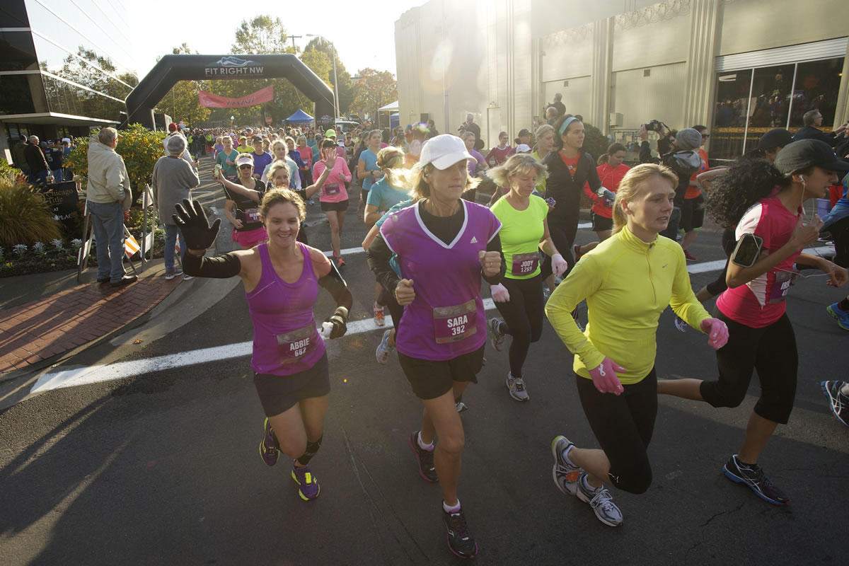 Runners take part in the 7th annual Girlfriends Half Marathon on a chilly Sunday.