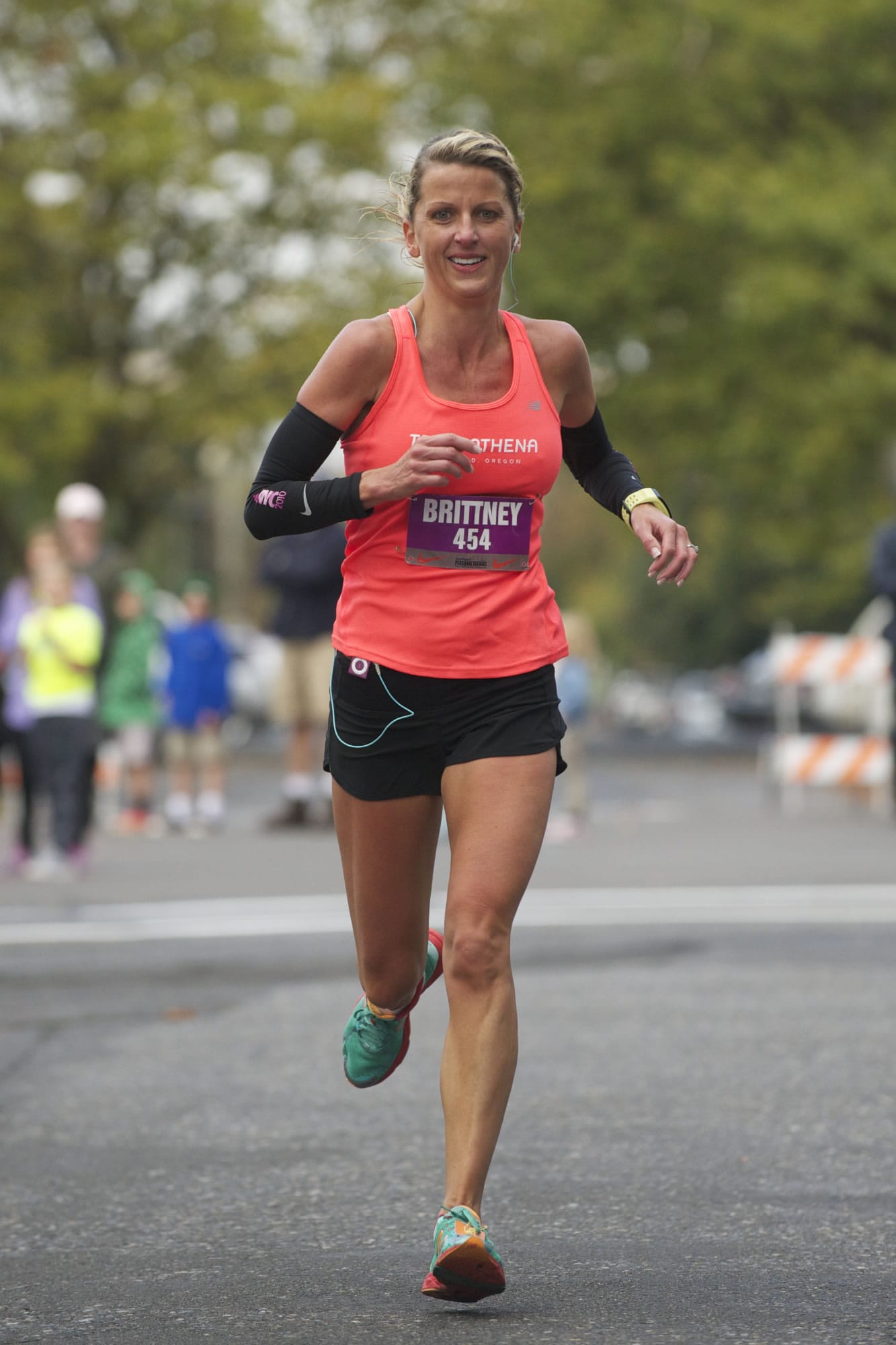 Brittney Forster, 39, of Beaverton, Ore.,, wins the 7th annual Girlfriends Half Marathon on a chilly Sunday morning. Proceeds from the 13.1 mile run will benefit Susan G.