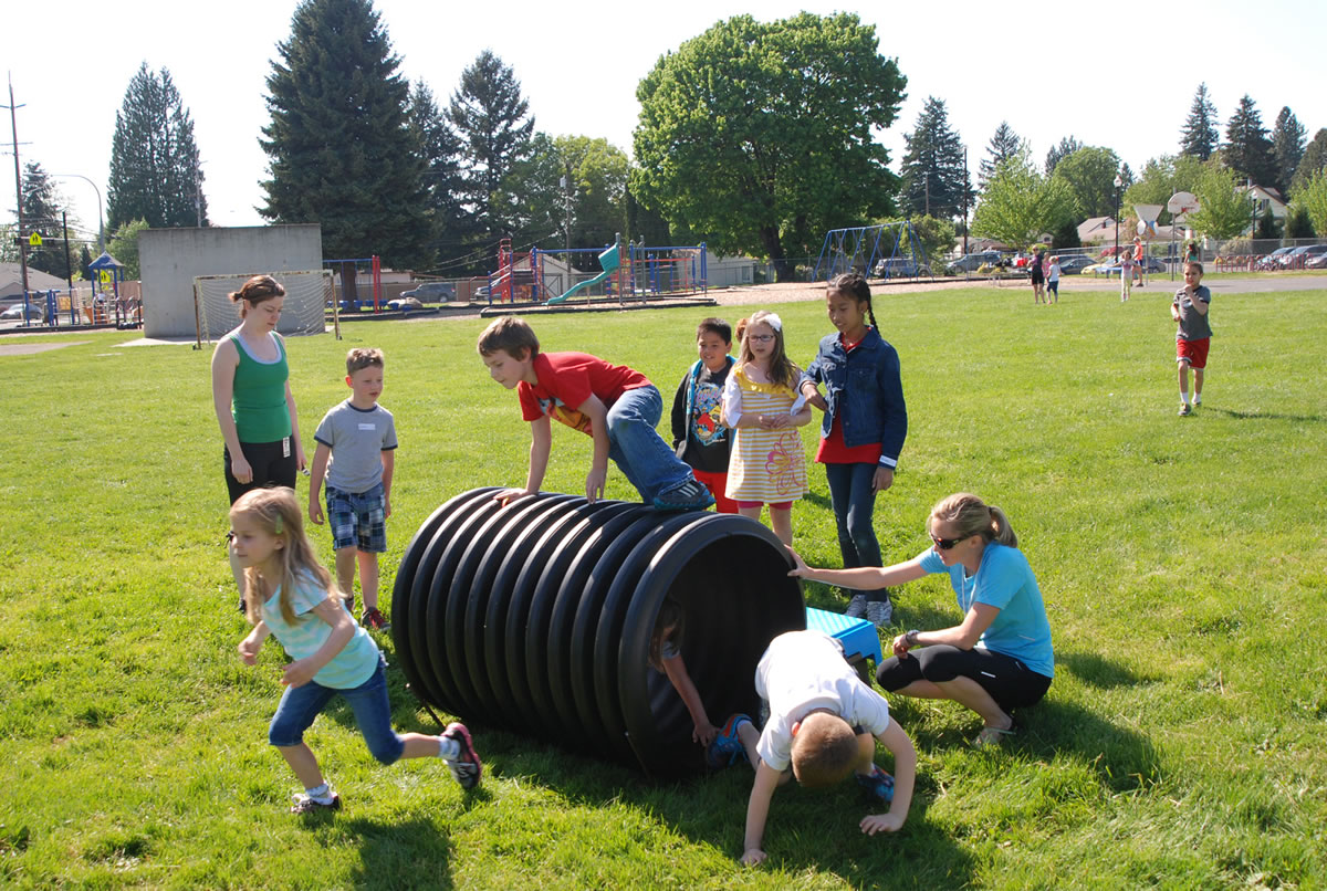 Washougal: Tracey Stinchfield, right, tries to make exercise fun for the nearly 150 Washougal elementary school students enrolled in her new running club, a six-week program offered through Washougal Community Education and Recreation.