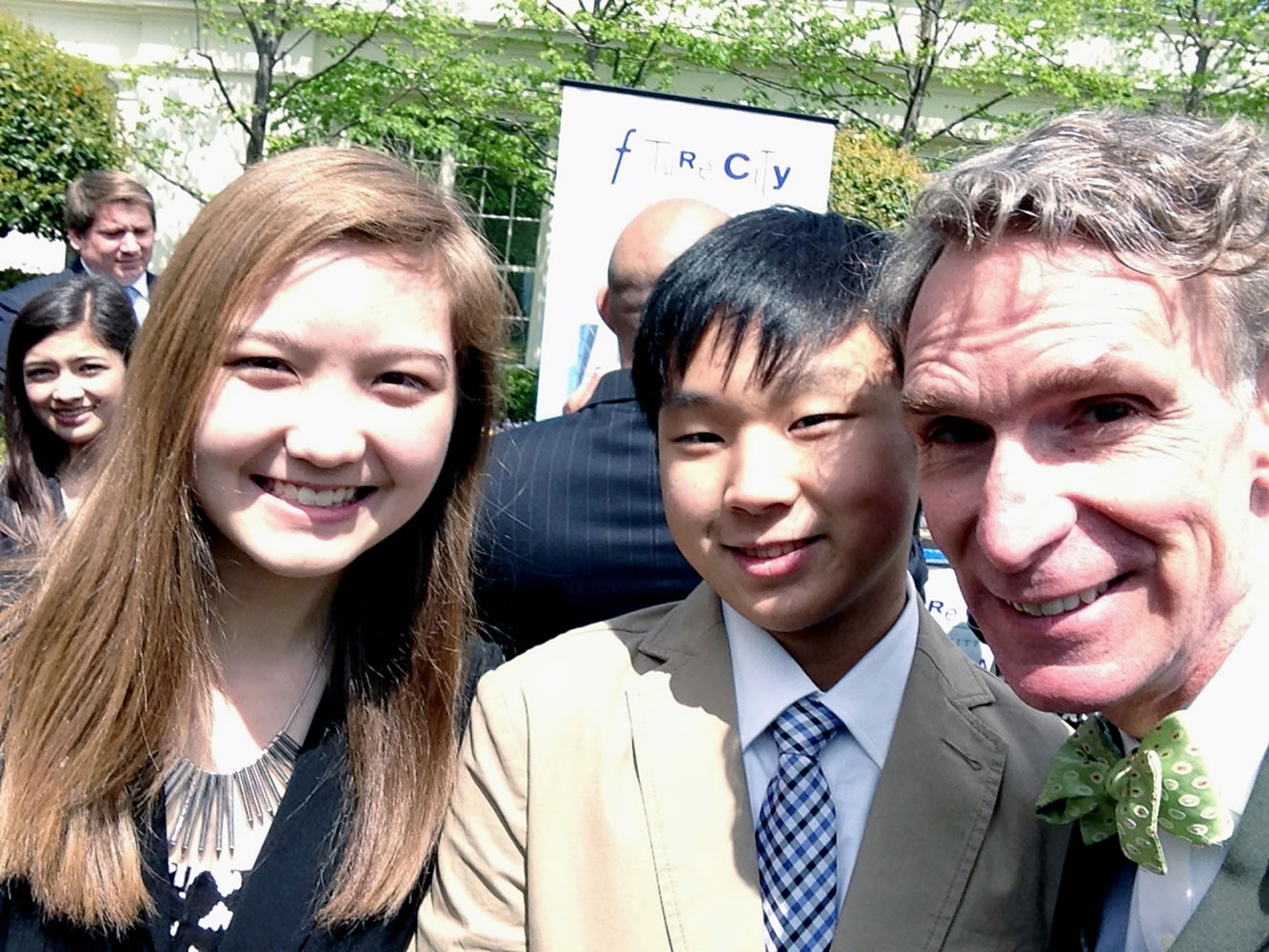 Fisher-Mill Plain: Union High School freshmen Sydney Wallace, left, and Austin Jang, center, are greeted by science educator and TV host Bill Nye the Science Guy at the White House Science Fair on April 22.