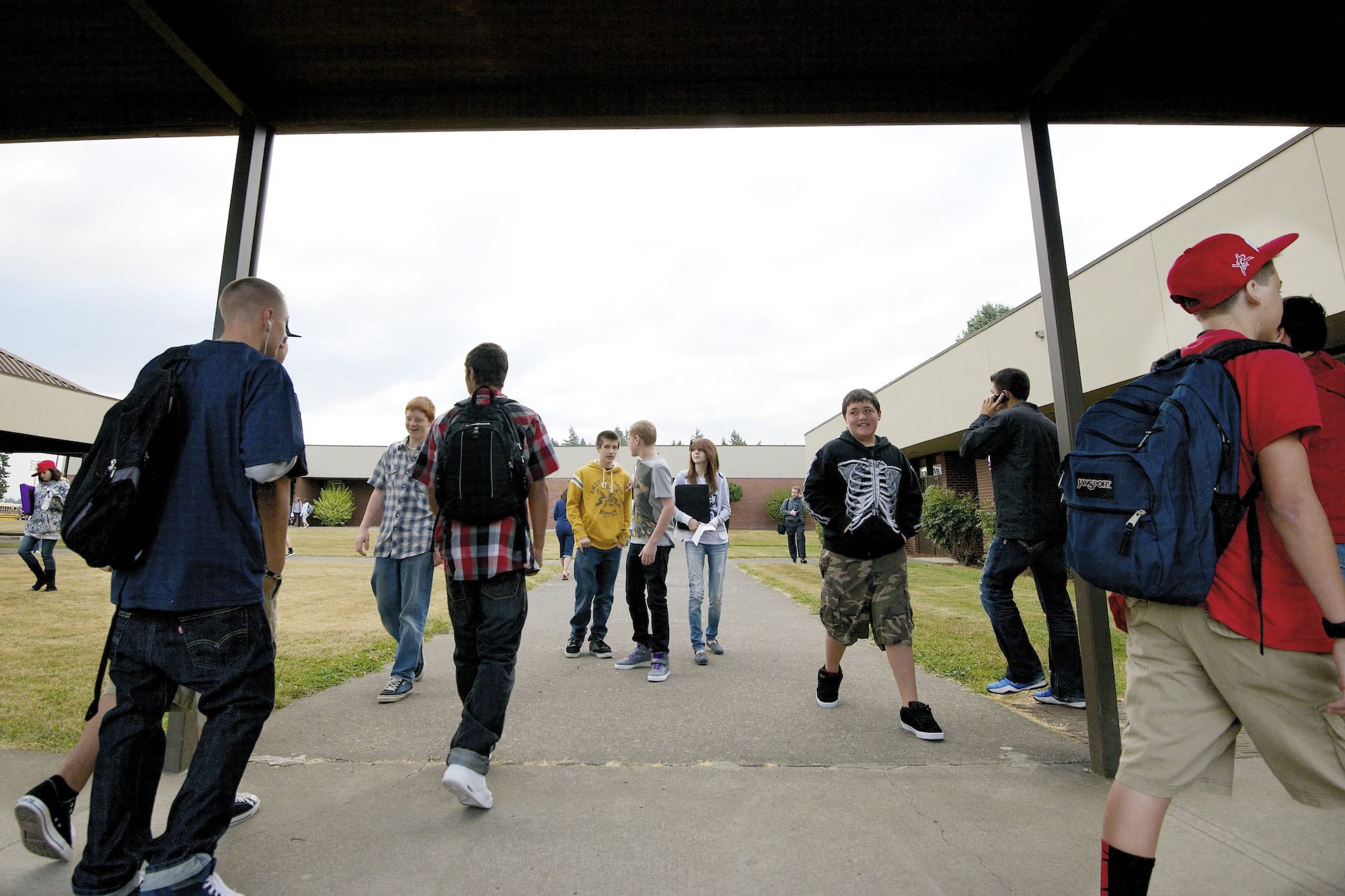 Students make their way to class during the first day of school at Ridgefield High School Wednesday, the same day last spring's standardized test results were released.