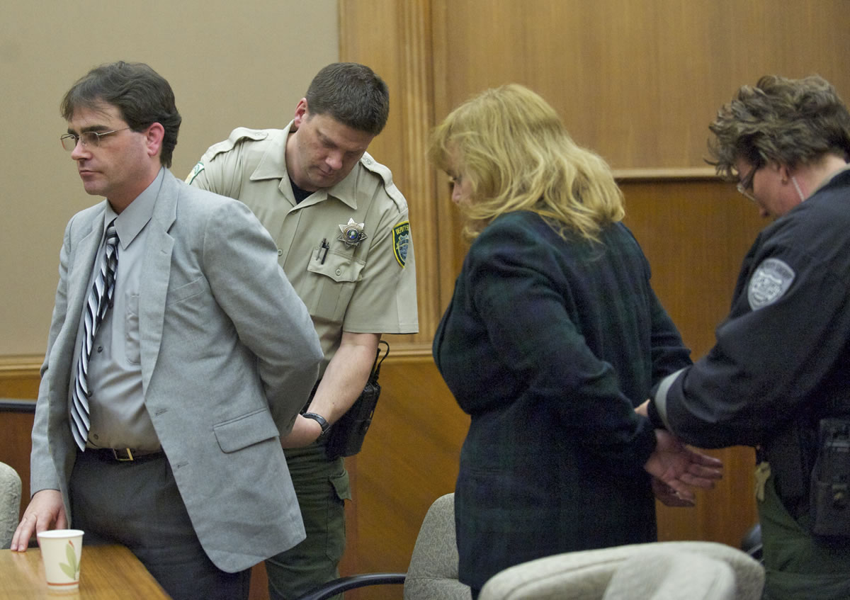 Jeffrey Weller, 43, and his wife, Sandra Weller, 50, are handcuffed after they were convicted in February of multiple felonies related to imprisoning, starving and beating their adopted twins.