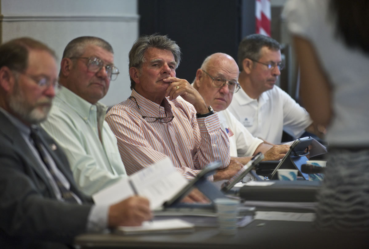 Ridgefield City Council members, from left, Darren Wertz, Lee Wells, Mayor Ron Onslow, David Taylor and Don Stose listen to a resident speak about a proposed dog park during an Aug. 9 meeting.