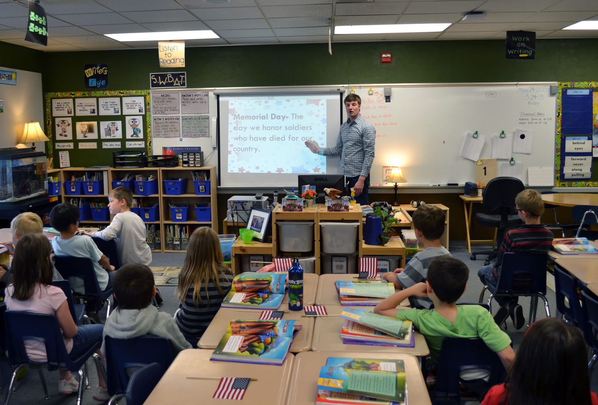 Ridgefield: Nathan Ingroum teaches his South Ridge Elementary School first-grade class the significance of Memorial Day before the holiday.