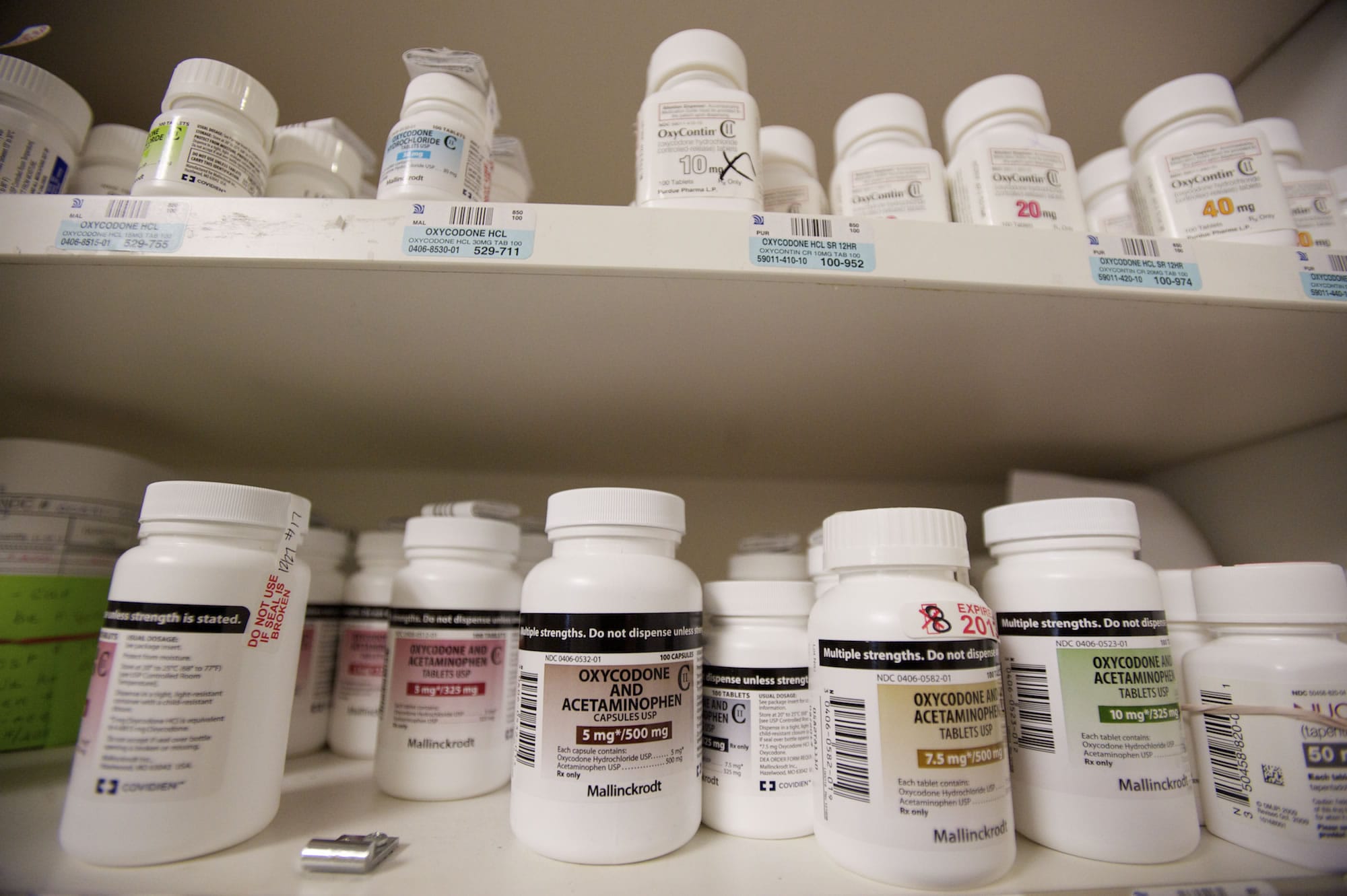 Pain medication prescriptions wait to be picked up by patients at the PeaceHealth Southwest Medical Center pharmacy.