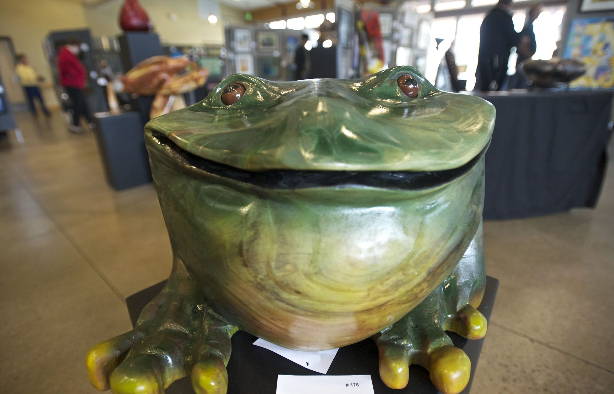 This large &quot;Frog,&quot; by artist Paul Gregurich, greeted art show visitors.
