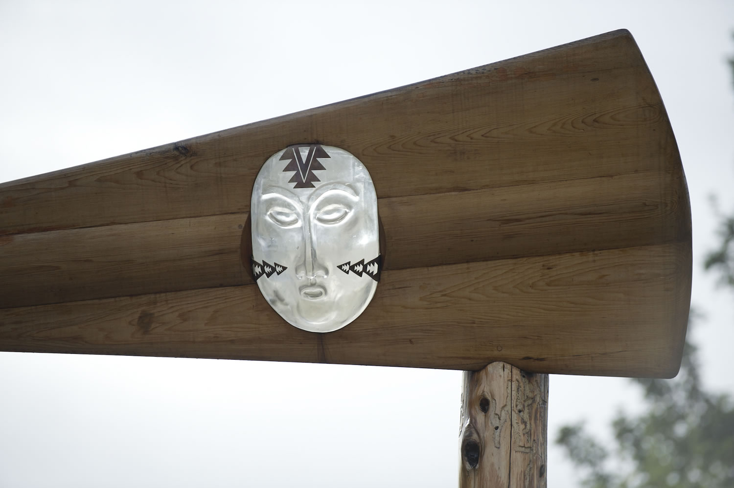 Lillian Pitt's artwork on the Vancouver Land Bridge includes the welcome gate topped with canoe paddles and a silver mask of a Chinook woman. &quot;I made the mask to honor Chinookan women,&quot; Pitt told the crowd.