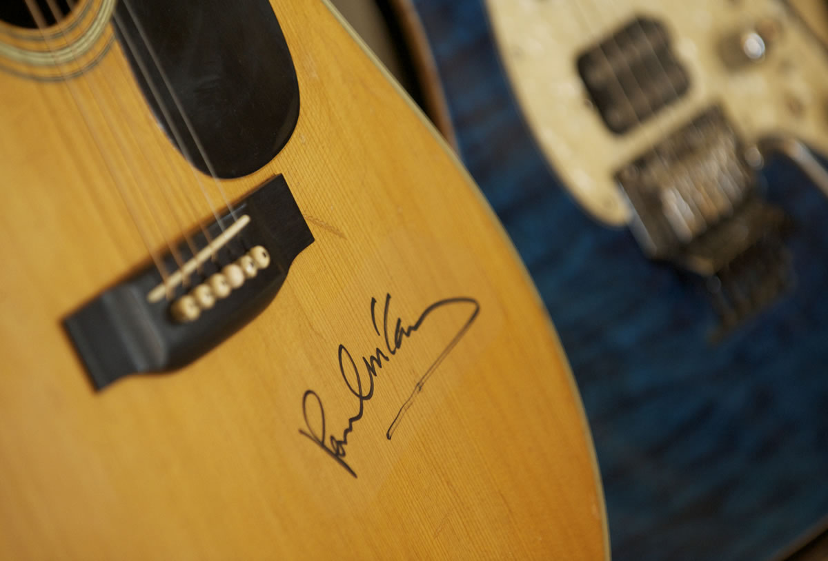 Local muscian Dave Raynor has an autograph of Paul McCartney on one of his guitars.