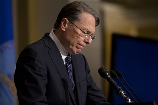 The National Rifle Association executive vice president Wayne LaPierre pauses as he makes a statement during a news conference in response to the Connecticut school shooting on Friday in Washington.