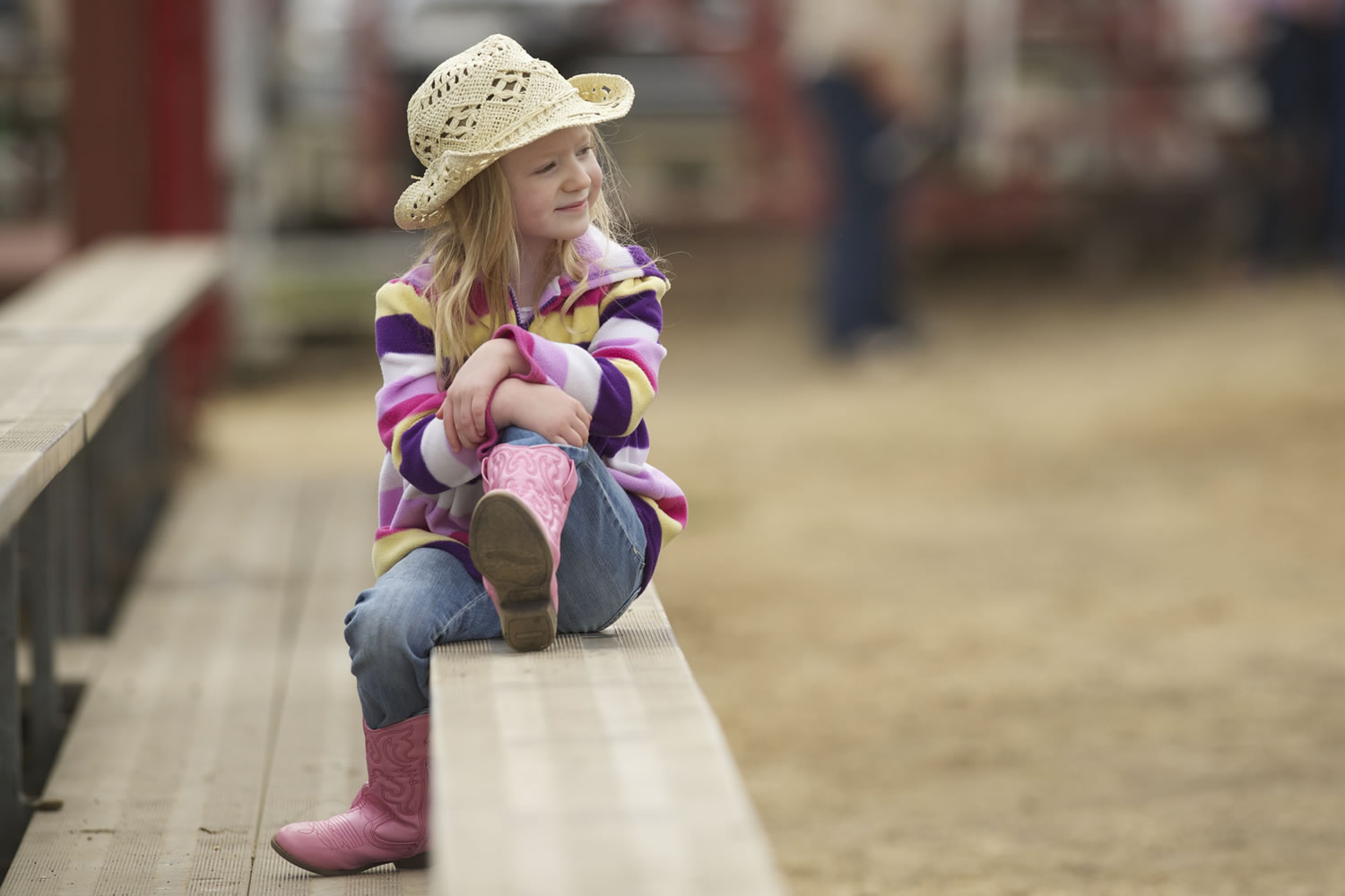 Photos by Steven Lane/The Columbian
Izzy Isenstein, 5, from Milwaukie, Ore., watches the Saturday morning action at the Vancouver Rodeo.