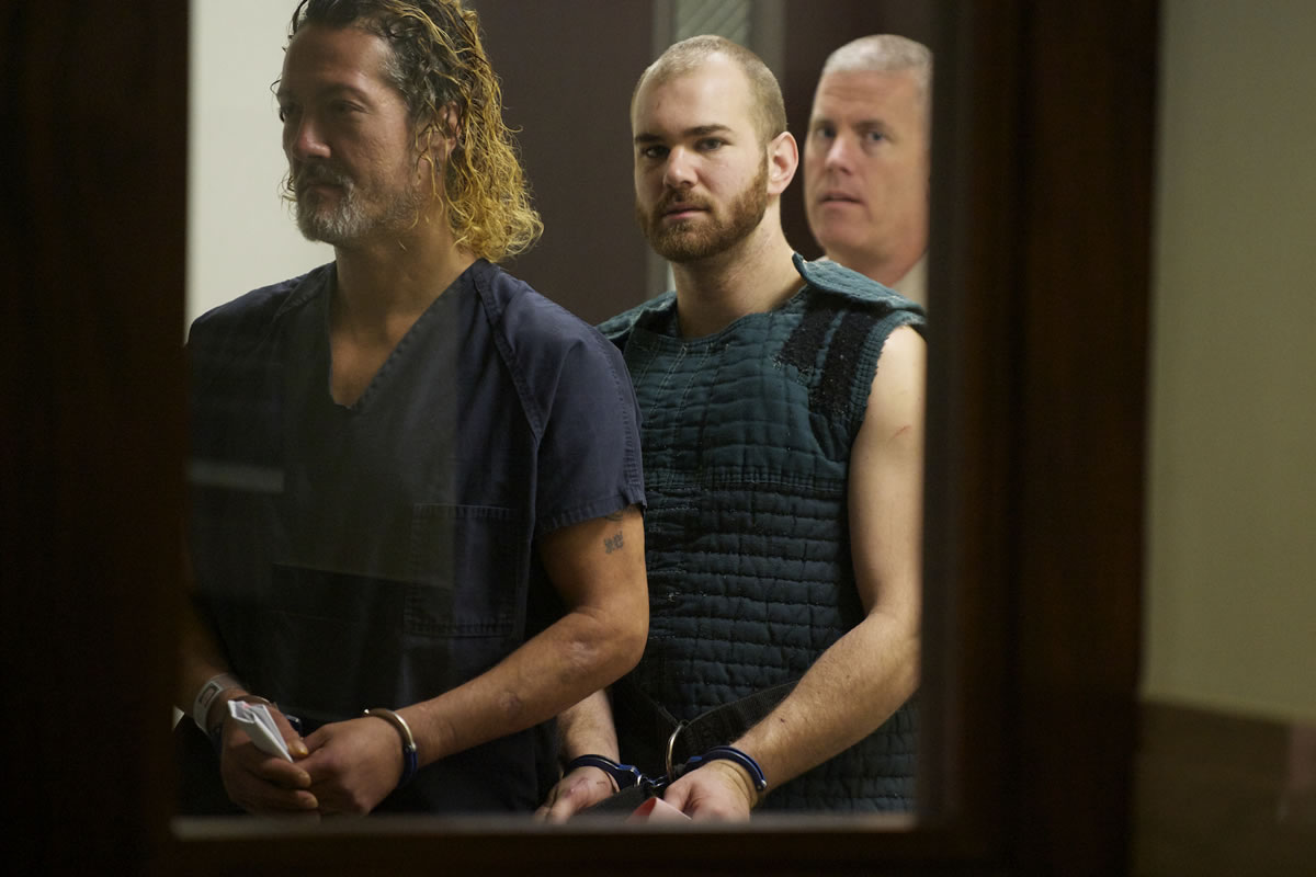 Neal C. Kelly, center, makes his first appearance, Monday, September 30, 2013, on charges of first degree murder and other charges relating to a stabbing over the weekend.