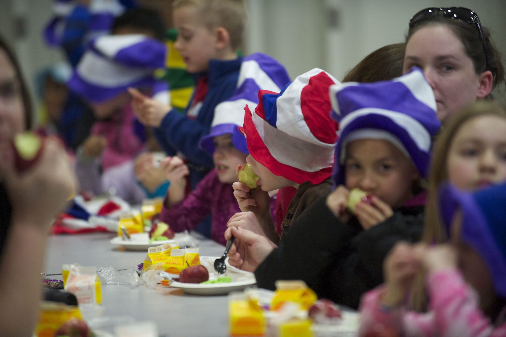 Harmony Elementary first-graders were treated to green eggs and ham and hats fashioned after Dr.