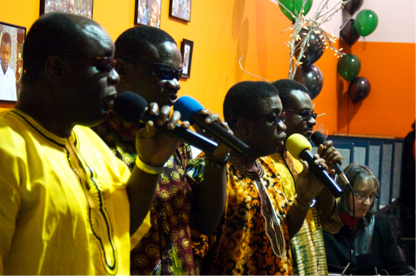 Meadow Homes: African Gospel Acappella, a Vancouver group, sang during The Giving Closet's fundraising meal.