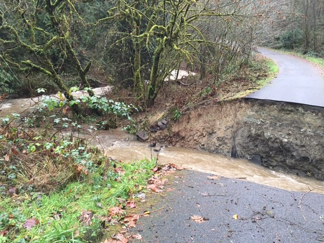 Water from this week&#039;s heavy rains washed out a private road serving six families in La Center.