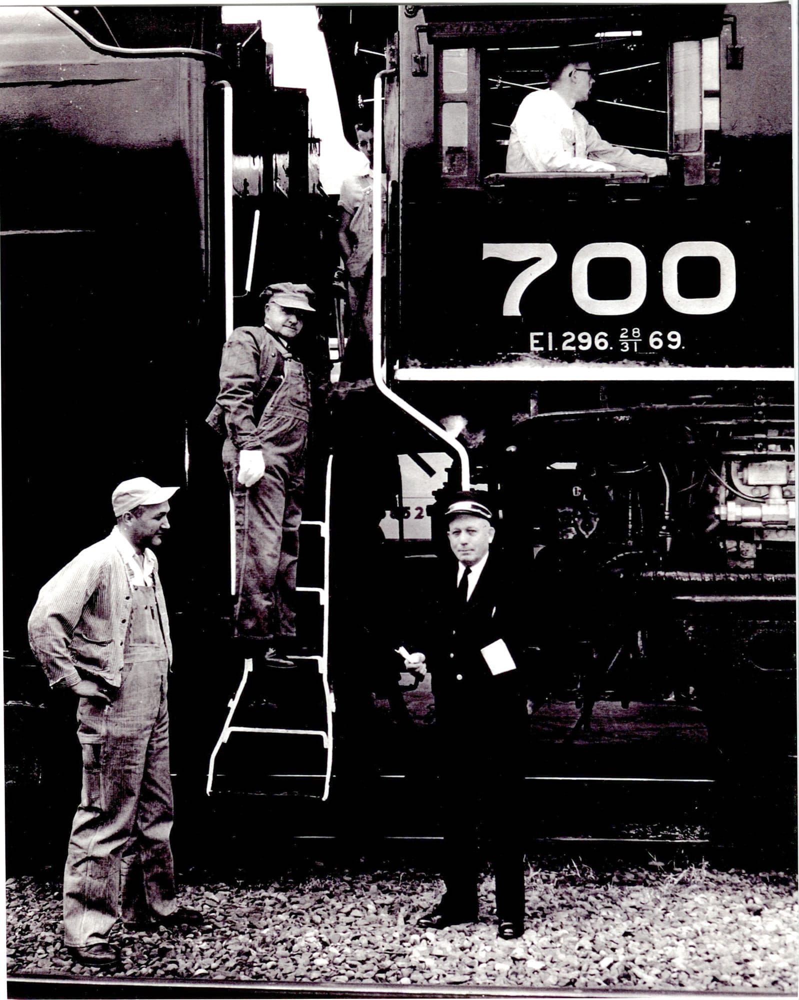 Bob Mercer, far left in overalls, was fireman on the final run of the SP&amp;S (Spokane, Portland and Seattle) 700 steam engine, from Union Station in Portland to Wishram. This photo was taken on May 20, 1955, and also pictured are engineer Tommy Crane, conductor H.L.