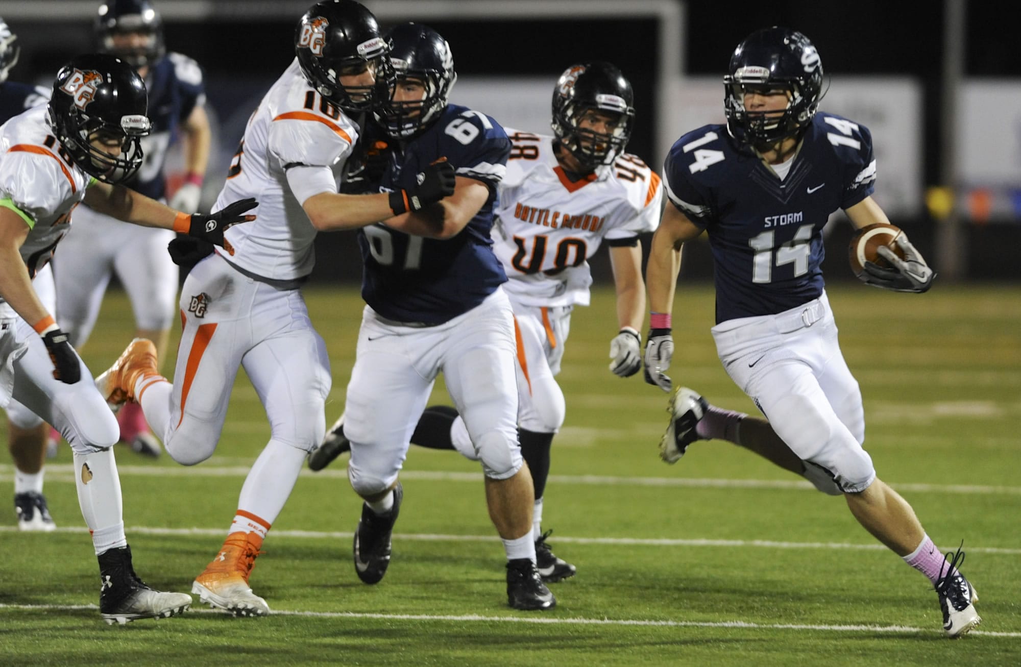 (Photo 1 of 8) Skyview's Dylan King (14) makes a run against Battle Ground during the first half Friday at Kiggins Bowl.