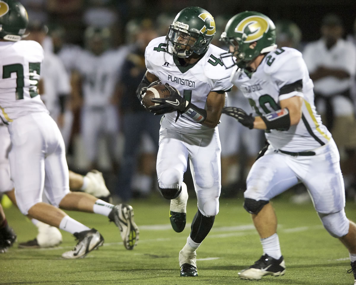 Evergreen's Robert Akil (4) had nine carries for 32 yards in the Plainsmen's come-from-behind-win over Prairie.