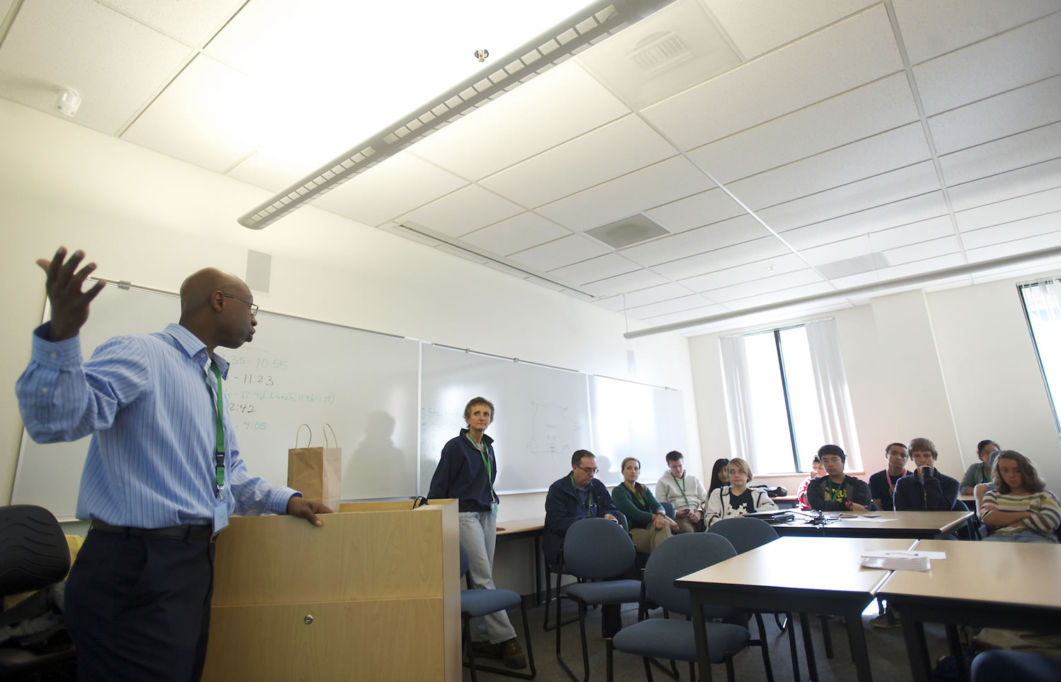 Bonneville Power Administration electrical engineer Ayo Idowu talks to a group of ninth-graders at Vancouver iTech Preparatory in October 2012 about a career in engineering with the BPA.