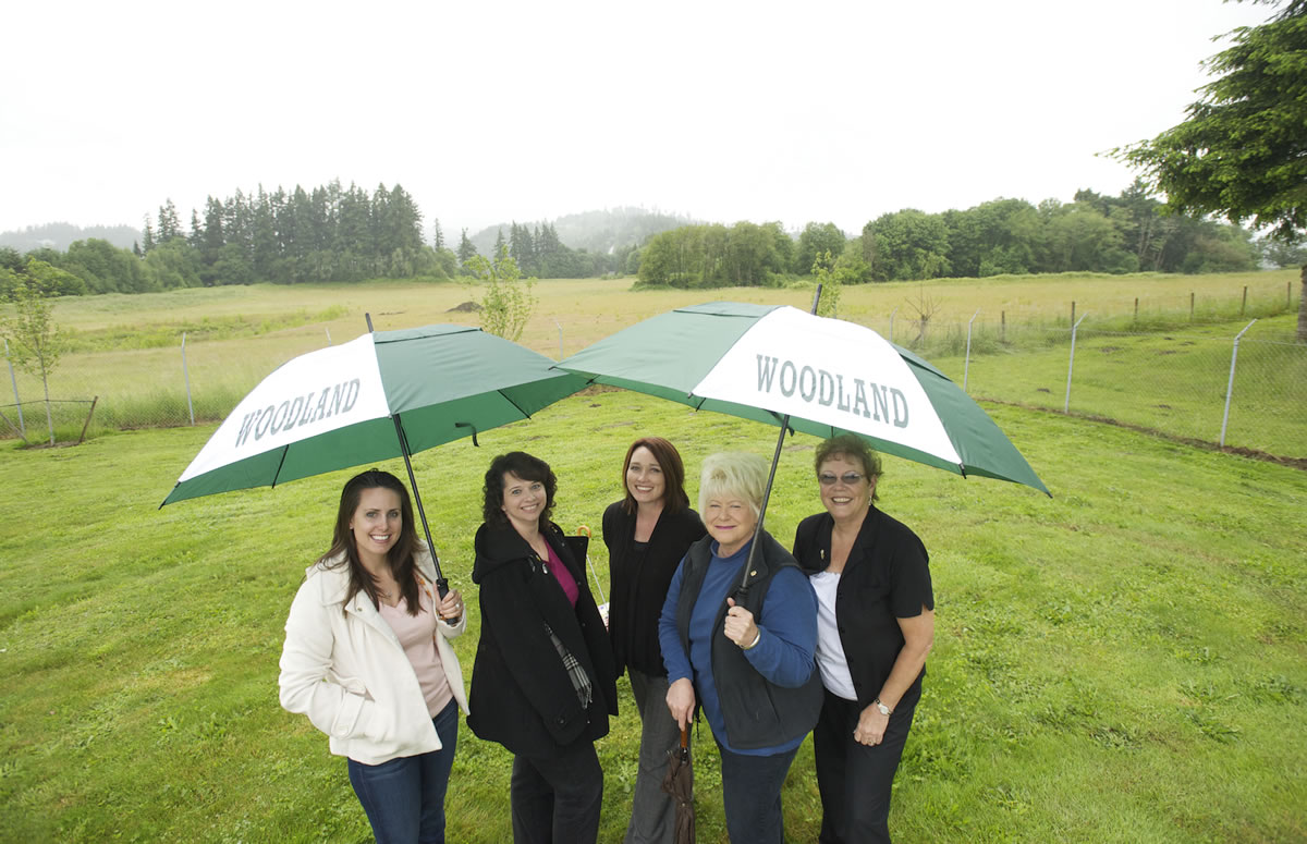 Members of the Woodland Rotary Park Committee, from left, Arwyn Borzone, Lesa Beuscher, Ingrid McQuivey, Sandy Larson and Carol Rounds gather at the future site of the Scott Hill Park and Sports Complex.