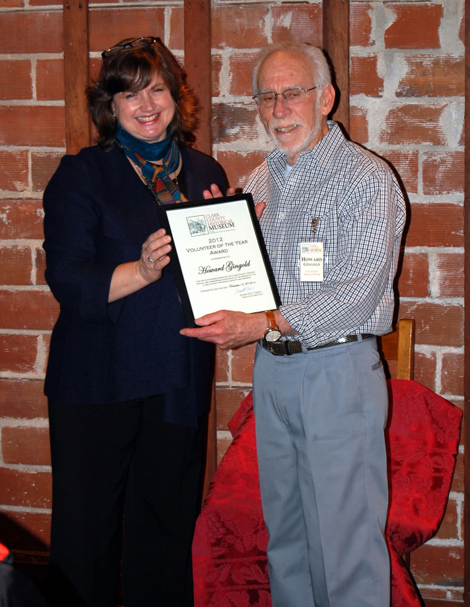 Esther Short: Clark County Historical Society Executive Director Susan Tissot presents the museum's Volunteer of the Year award to Howard Gingold for donating more than 2,000 hours of time in five years.