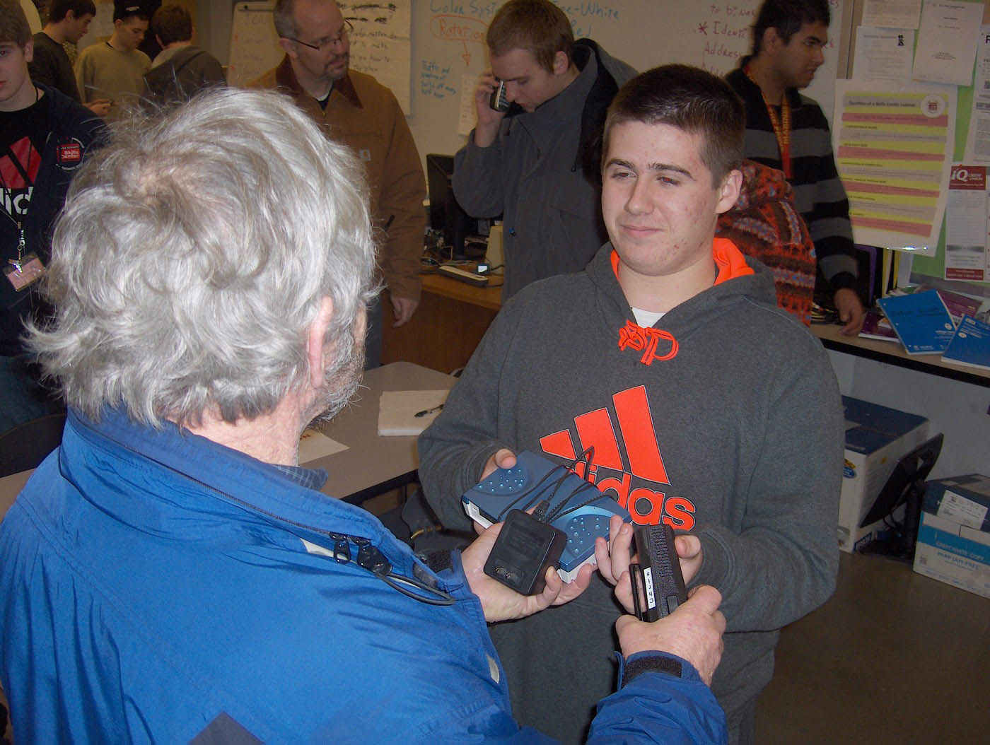 Image: La Center High School senior Ryan Larkin accepts a donation of electronic waste during Clark County Skills Center's e-waste recycling event in January.