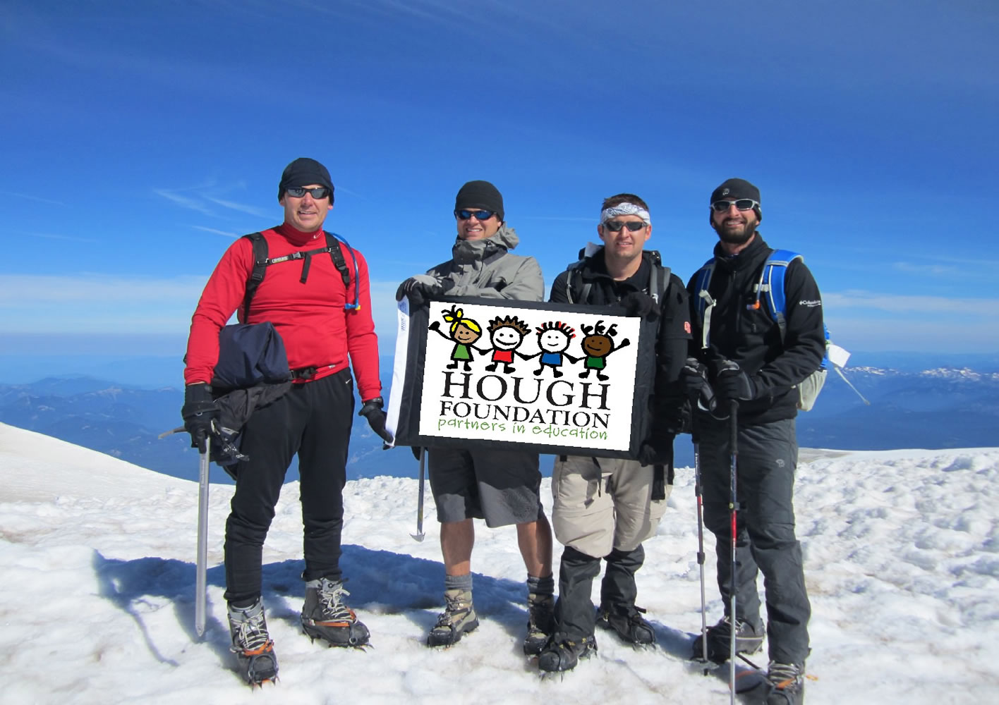 Port of Vancouver employees Todd Coleman, from left, Jonathan Eder, Matt Graves and Phil Martello climbed to the summit of Mount Adams on their Hike for Hough.