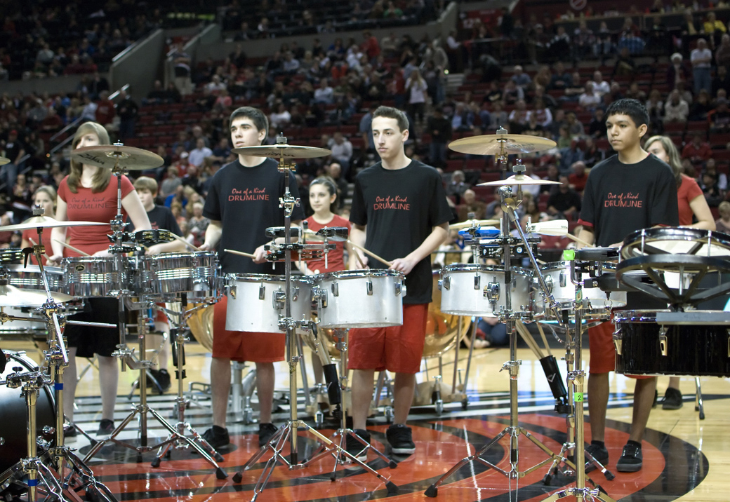 Members of the One of A Kind Drumline get ready to rock at a recent performance.